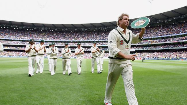 Shane Warne walks from the MCG after taking his 700th wicket. Picture: Getty Images