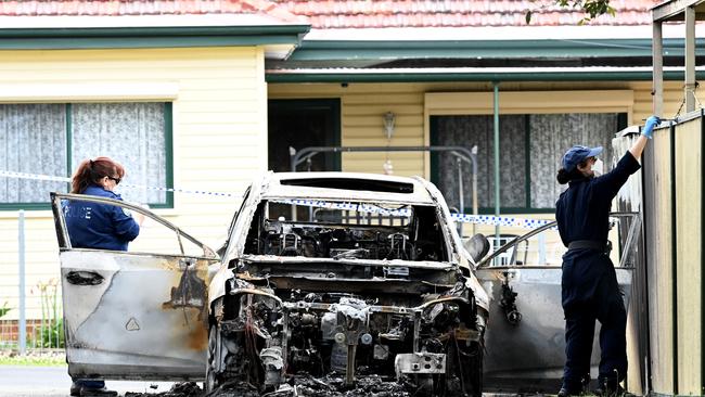 Forensic officers are inspecting a burnt vehicle near the scene of the shooting. Picture: NCA NewsWire / Jeremy Piper