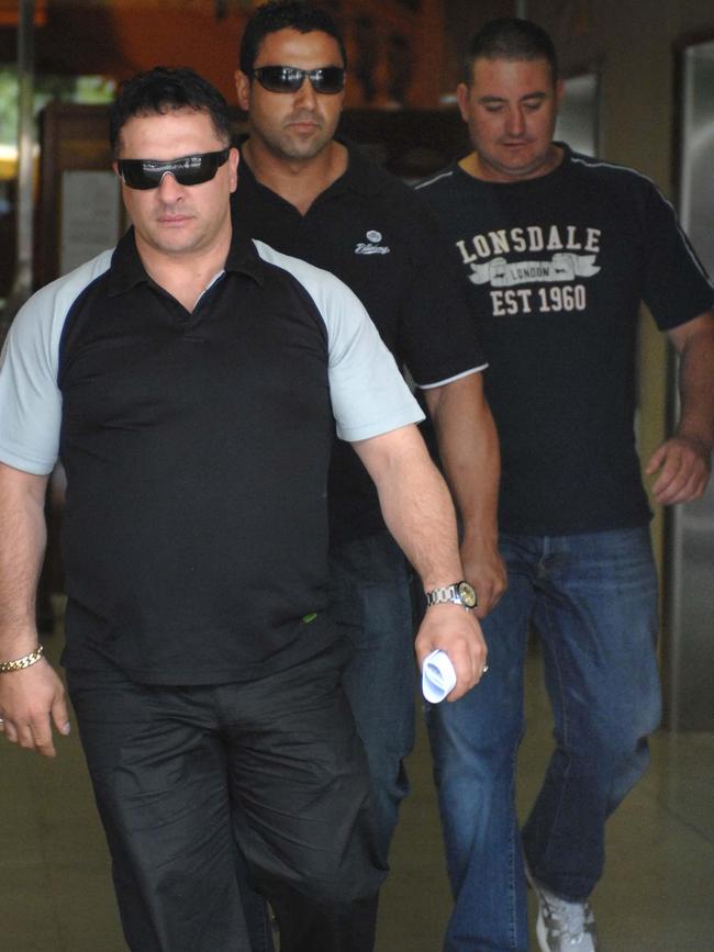 Hells Angels members George Petropolus, Angelo Pandeli and Leighton John Dial outside the Adelaide District Court in 2006. Picture: News Corp