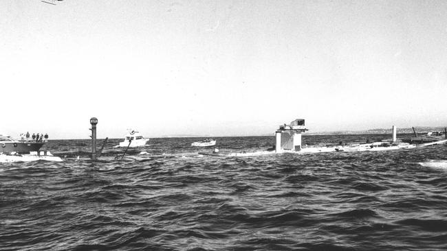 The Bellubera about to disappear beneath the waves. Photo Manly Daily