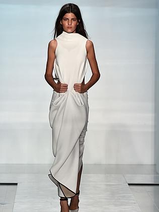 A model walks the runway in neoprene at the Maticevski show during Mercedes-Benz Fashion Week Australia 2014.