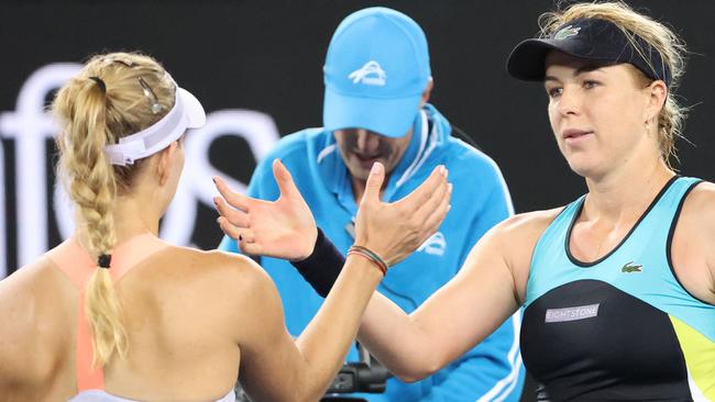 Anastasia Pavlyuchenkova (R) shakes hands with Angelique Kerber. Picture: David Gray/AFP