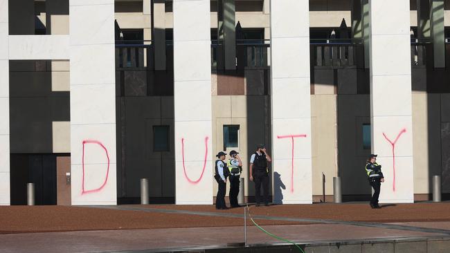 Extinction Rebellion protesters spray-painted the front of Parliament House. Picture: Gary Ramage