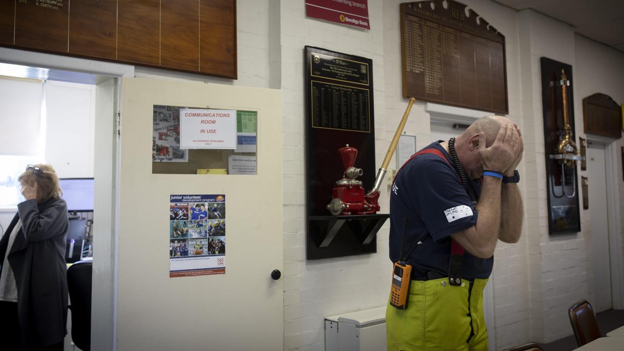 The work to help residents affected by the huge storm that hit Kalomara takes its toll on CFA volunteer Shayne O'Dwyer. Picture: Arsineh Houspian