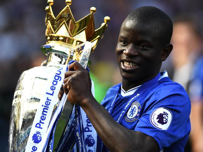 LONDON, ENGLAND - MAY 21: N'Golo Kante of Chelsea celebrates with the Premier League Trophy after the Premier League match between Chelsea and Sunderland at Stamford Bridge on May 21, 2017 in London, England.  (Photo by Shaun Botterill/Getty Images)