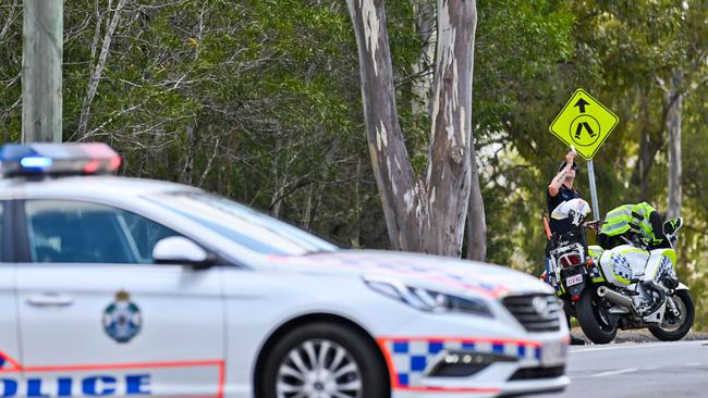 A police car and motorcycle block off a road at Bundamba. Picture: Cordell Richardson