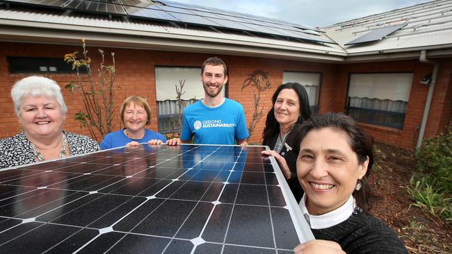 Solar Homes Minister Lily D'Ambrosio (right) inspecting a solar panel. Picture: Glenn Ferguson