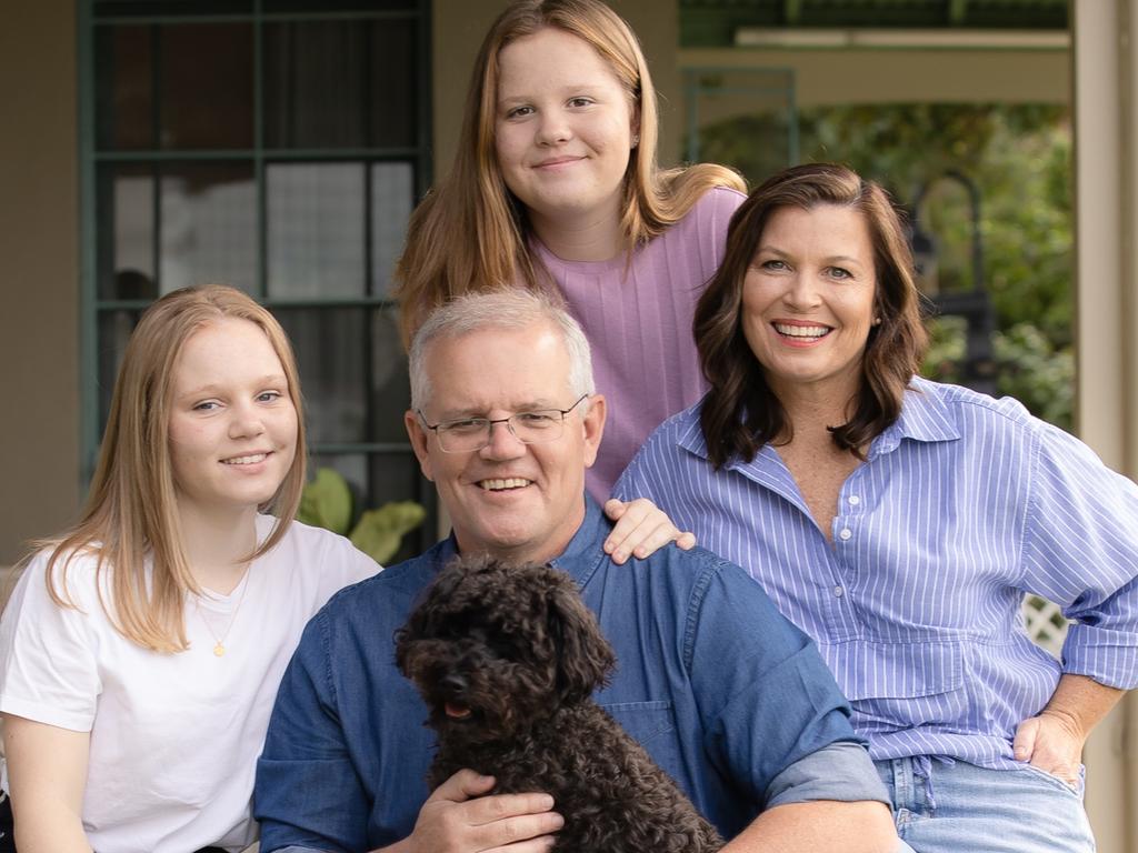 Prime Minister Scott Morrison with wife Jenny and children Abbey and Lily along with dog Buddy at Kirribilli House. Picture: Jason Edwards