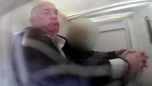 A handcuffed Gordon Nuttall in the back of a police van in 2009 after being jailed for seven years for taking corrupt payments from Ken Talbot and Harold Shand. He has been found guilty of more charges of corruption and perjury. Picture: Channel 7