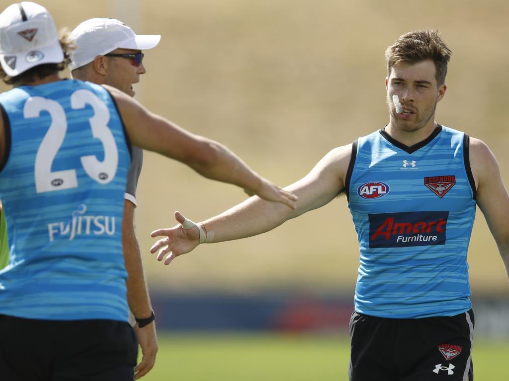 Merrett joins Brayden Ham, Harrison Jones (left), Devon Smith and Alec Waterman in re-signing with Essendon this year. Picture: NCA NewsWire / Daniel Pockett