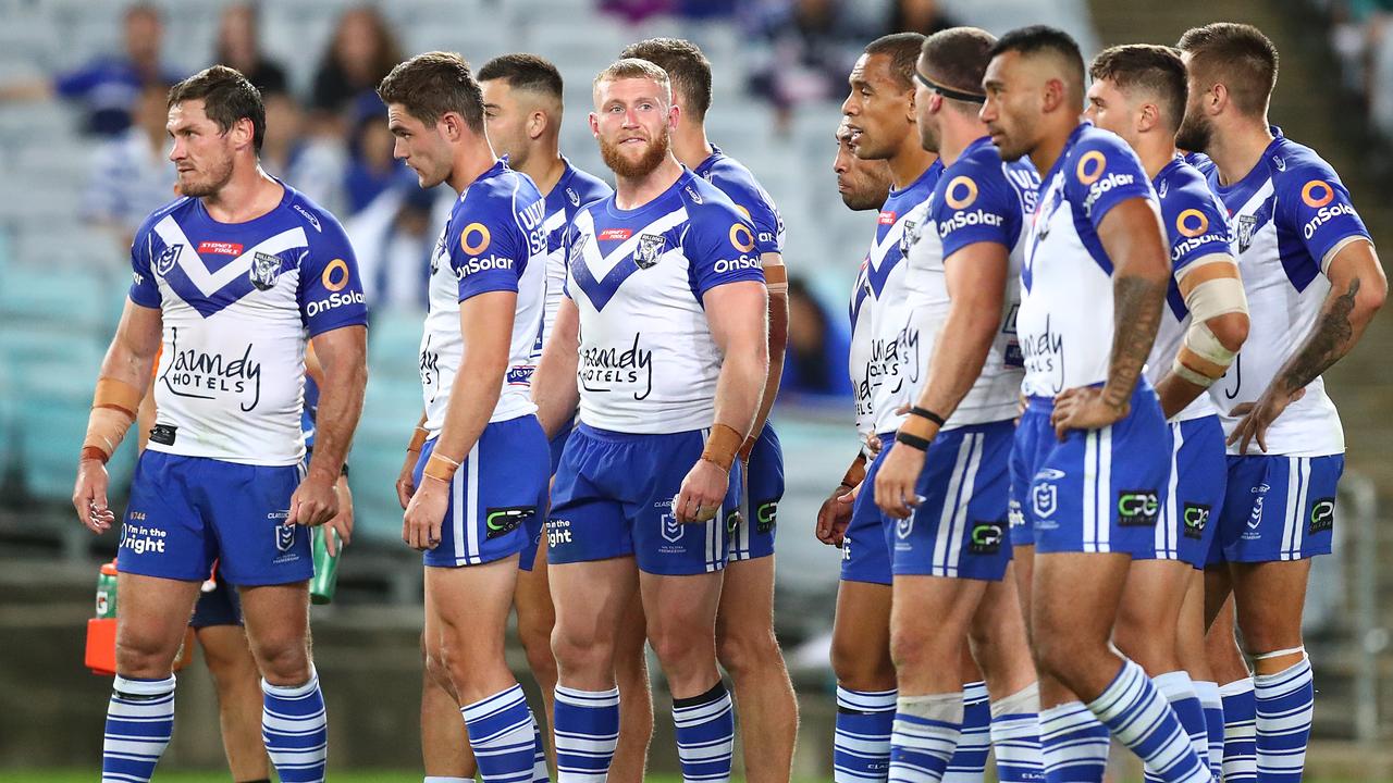 SYDNEY, AUSTRALIA - APRIL 10: Bulldogs players look dejected after conceding a try during the round five NRL match between the Canterbury Bulldogs and the Melbourne Storm at Stadium Australia, on April 10, 2021, in Sydney, Australia. (Photo by Mark Metcalfe/Getty Images)