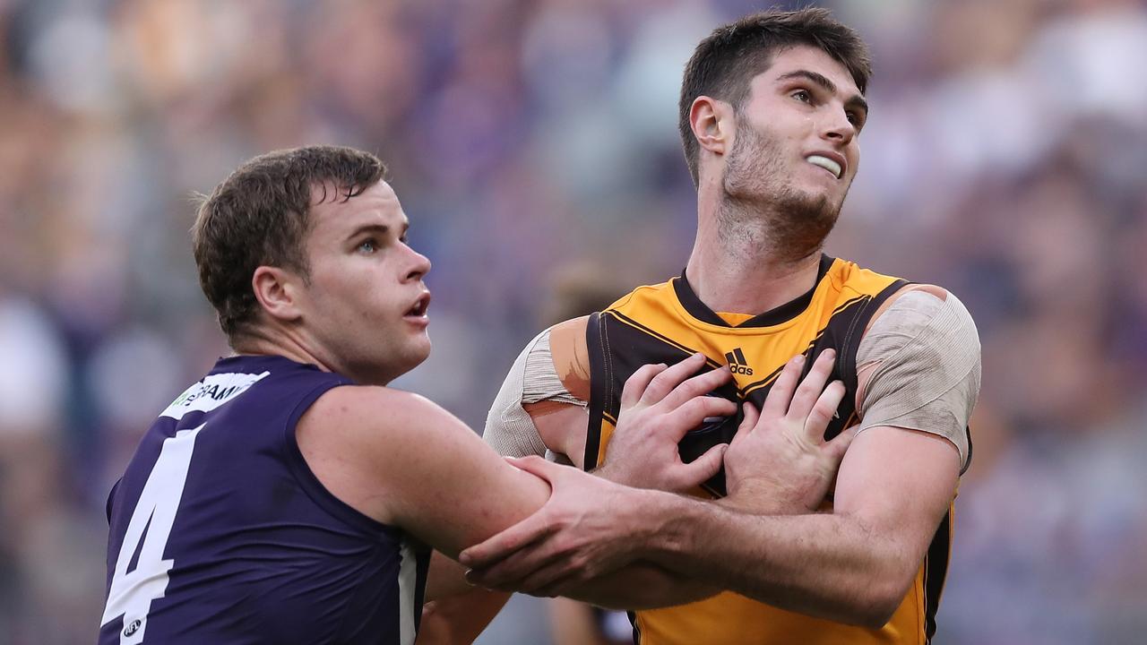 Sean Darcy of the Dockers contests a ruck with Ned Reeves of the Hawks. (Photo by Will Russell/AFL Photos via Getty Images)