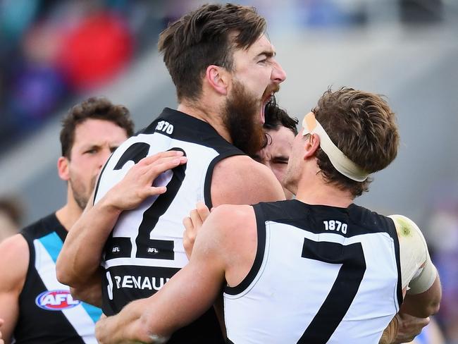 MELBOURNE, AUSTRALIA - AUGUST 19:  Charlie Dixon of the Power celebrates kicking a goal during the round 22 AFL match between the Western Bulldogs and the Port Adelaide Power at Mars Stadium on August 19, 2017 in Melbourne, Australia.  (Photo by Quinn Rooney/Getty Images)