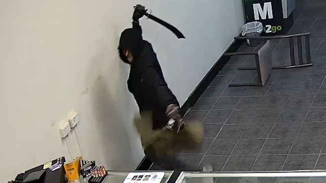 A man armed with a machete had a chair thrown at him in an attempted robbery of a Rockhampton business.