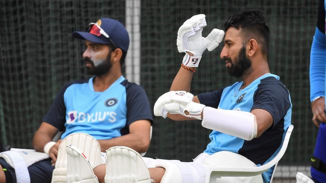 India's Cheteshwar Pujara (right) and Ajinkya Rahane weren’t involved in the Indian restaurant saga. Picture: William West/AFP