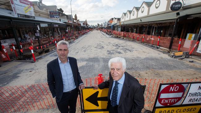 Landlords Chris and Con Angelopoulos on King William Rd in front of several business premises that they own. Picture: Kelly Barnes