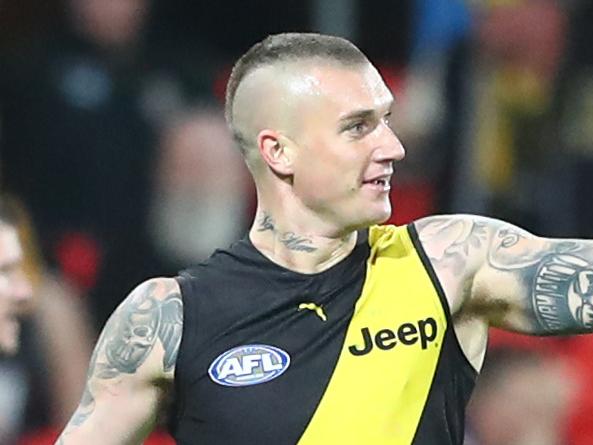 GOLD COAST, AUSTRALIA - JULY 29: Dustin Martin of the Tigers celebrates a goal during the round nine AFL match between the Western Bulldogs and the Richmond Tigers at Metricon Stadium on July 29, 2020 in Gold Coast, Australia. (Photo by Chris Hyde/Getty Images)