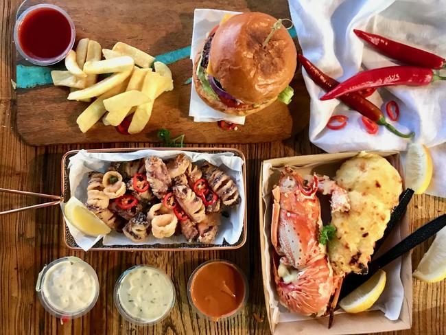 The Boatshed’s menu selection includes lobster mornay, salt and pepper calamari and angus beef burgers. Picture: Jenifer Jagielski