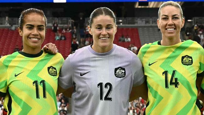 Australia's starting lineup poses for a photo during the SheBelieves Cup football match between USA and Australia at State Farm Stadium in Glendale, Arizona, on February 23, 2025. (Photo by Patrick T. Fallon / AFP)