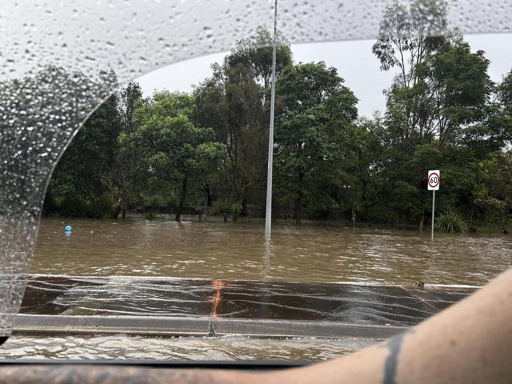 Roads went under at Upper Coomera during a big downpour. Picture: Facebook