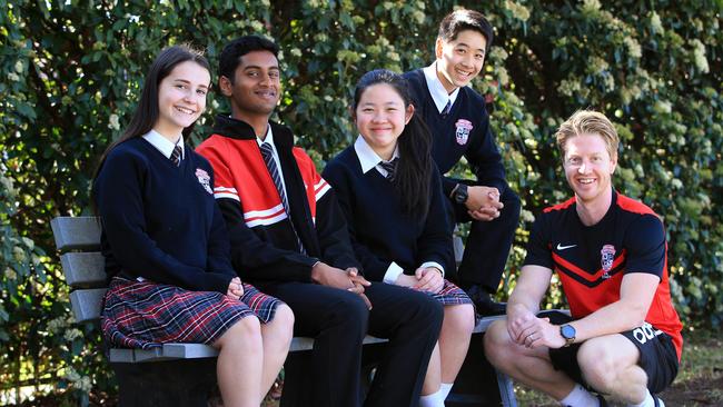 Noble Park award participants Cara Hooper-Ford, Jonathan Manoj, Chenda Pidor, Huy Vu and co-ordinator Sean Dickson. Picture: Aaron Francis