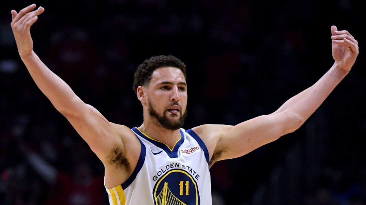 LOS ANGELES, CALIFORNIA - APRIL 26: Klay Thompson #11 of the Golden State Warriors celebrates an offensive foul by Montrezl Harrell #5 of the LA Clippers in the first half during Game Six of Round One of the 2019 NBA Playoffs at Staples Center on April 26, 2019 in Los Angeles, California. (Photo by Harry How/Getty Images) NOTE TO USER: User expressly acknowledges and agrees that, by downloading and or using this photograph, User is consenting to the terms and conditions of the Getty Images License Agreement.