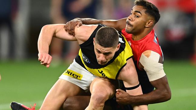 Dion Prestia injures his ankle when tackled by Kysaiah Pickett.