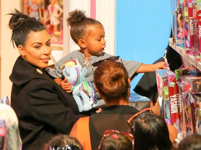 Pregnant Kim Kardashian spoils North West at Toys‘R’Us in Time Square. Picture: Splash