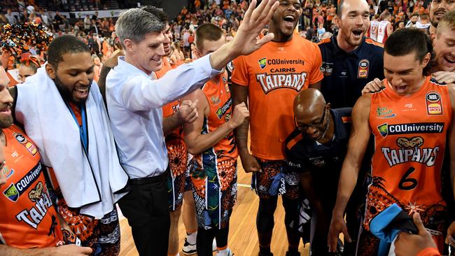 Taipans coach Mike Kelly salutes his players following the Round 18 NBL match between the Cairns Taipans and the Illawarra Hawks at the Cairns Convention Centre in Cairns, Friday, January 31, 2020. (AAP Image/Brian Cassey)