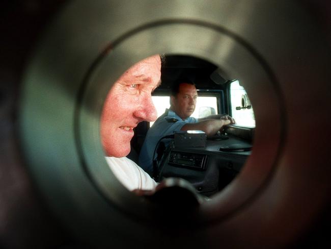 Former Qld police Minister Russell Cooper and officer Mark Fritz inside the prison’s new armoured Hummer vehicle at Sir David Longland Correctional Centre in 1998. The cars were purchased in the aftermath of the Abbott escape. Picture: Nathan Richter