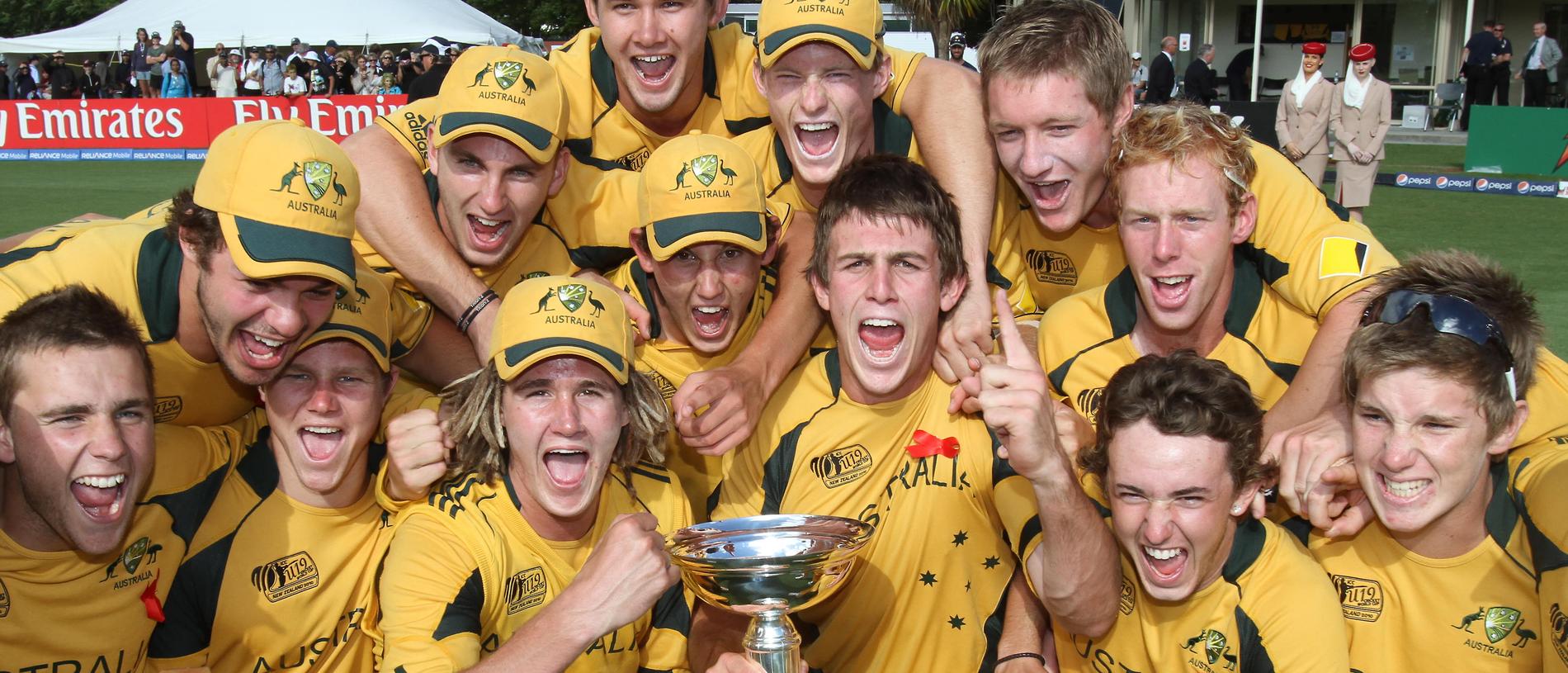 Australian players celebrate after defeating Pakistan in the Under-19 World Cup cricket final at the Bert Sutcliffe Oval in Christchurch on January 30, 2010.  Australia won the game by 25 runs.   AFP PHOTO / Brendon O'Hagan