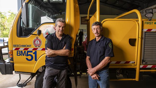 Beechmont Rural Fire Brigade first officer, Mark Ayers, with Greg McKenzie, a volunteer firey for 35 years. Picture: Mark Cranitch