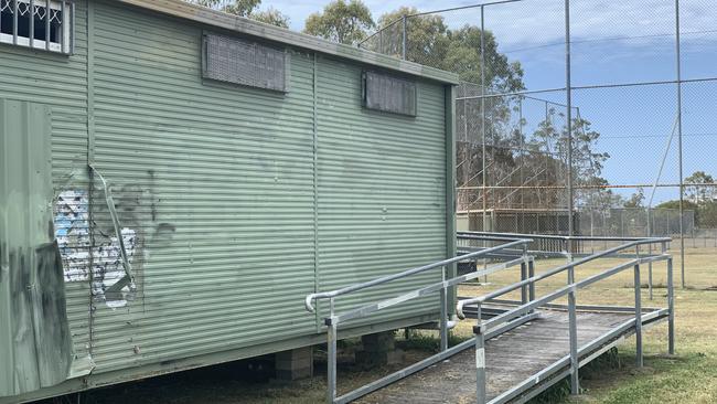 Community members are calling for the building at the rear of O'Callaghan Park in Zillmere to be destroyed.
