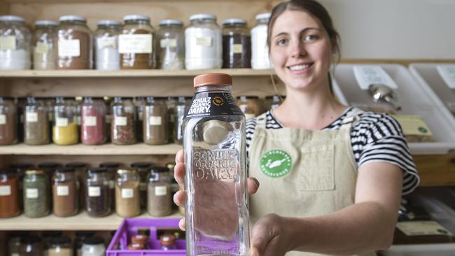 Sarah Main runs Winchelsea Wholefoods and stocks Schulz Organic Dairy products, including milk in glass bottles which is part of a container deposit scheme. Photo: DANNIKA BONSER