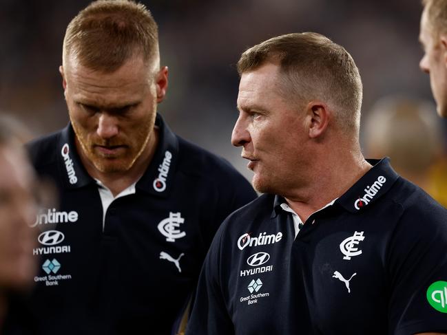 MELBOURNE, AUSTRALIA - MARCH 20: Michael Voss, Senior Coach of the Blues looks on during the 2025 AFL Round 02 match between the Carlton Blues and the Hawthorn Hawks at the Melbourne Cricket Ground on March 20, 2025 in Melbourne, Australia. (Photo by Michael Willson/AFL Photos via Getty Images)