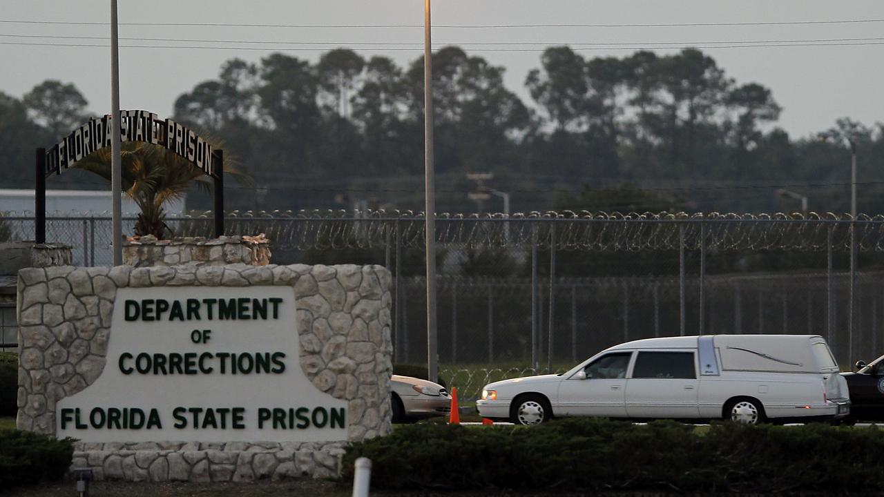 A hearse arrives at the Florida State Prison after an execution in Starke, Florida where Moore lived on death row.