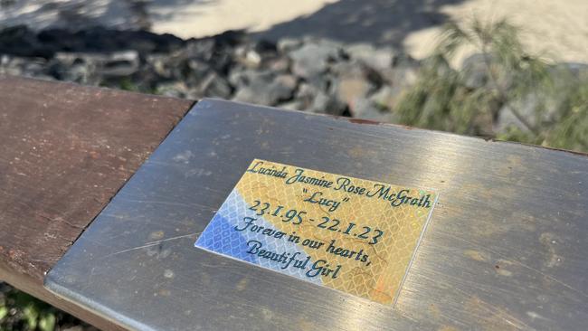 A plaque has been placed in memory of Lucinda McGrath along a railing at Happy Valley, Caloundra.