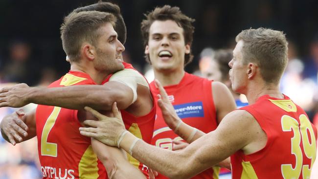 Anthony Miles celebrates a vital goal for the Suns. Picture: AAP Images 