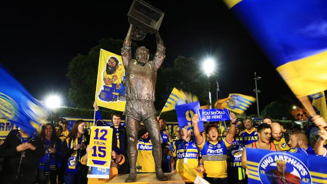 Eels fans gather around the Ray Price statue as a mark of solidarity before the Parramatta Eels v South Sydney Rabbitohs NRL round 10 game at Pirtek Stadium, Parramatta. pic Mark Evans