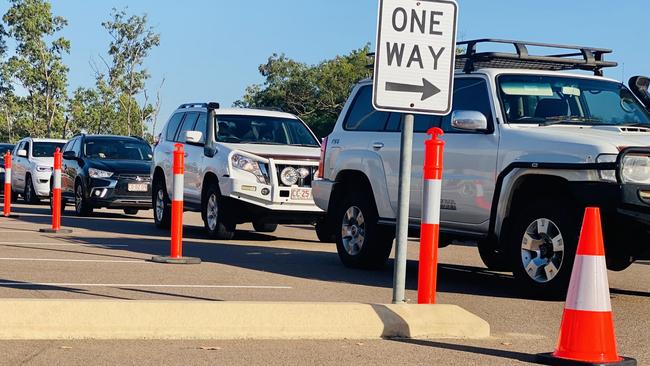 Cars line up for Covid-19 testing outside the Marrara netball stadium this morning. Picture: Gary Shipway