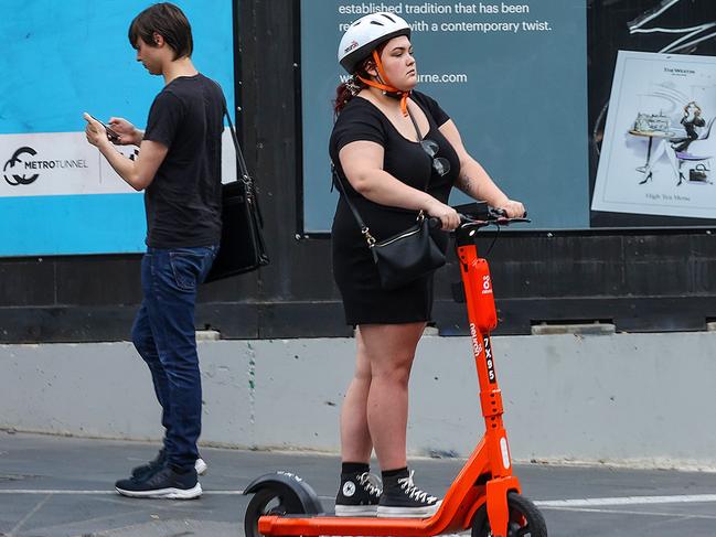 MELBOURNE, AUSTRALIA - NewsWire Photos 16 FEBRUARY 2022 : People riding E-scooters around MelbourneÃs CBD. Picture: Ian Currie.