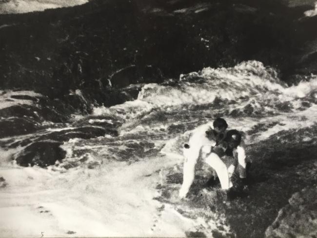 Undated copy photo of rescuers scrambling to safety during heavy seas at Snapper Point. Picture courtesy of Glenn Gifford