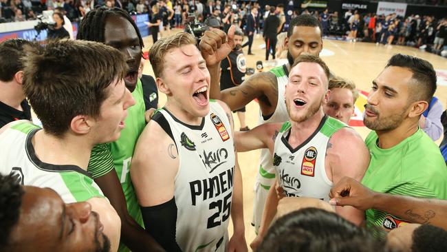 South East Melbourne Phoenix players, including Mitch Creek (second from right) celebrate their big win. Picture: Michael Klein