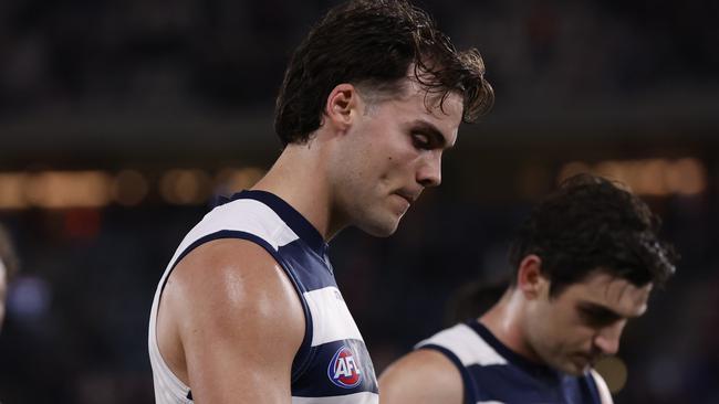 MELBOURNE, AUSTRALIA - AUGUST 17:  Dejected Geelong players walk from the ground after the round 23 AFL match between St Kilda Saints and Geelong Cats at Marvel Stadium, on August 17, 2024, in Melbourne, Australia. (Photo by Darrian Traynor/Getty Images)