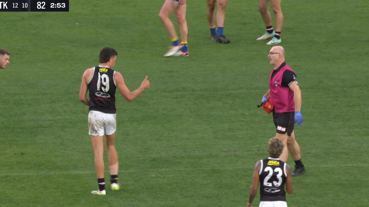 Rowan Marshall waved away the trainer after a brutal head knock.
