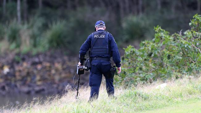 A police strike force has been set up to investigate the death of Stockton man Graham Cameron. Police continue to search the burnt out unit and surrounds looking for evidence. Picture by Peter Lorimer.