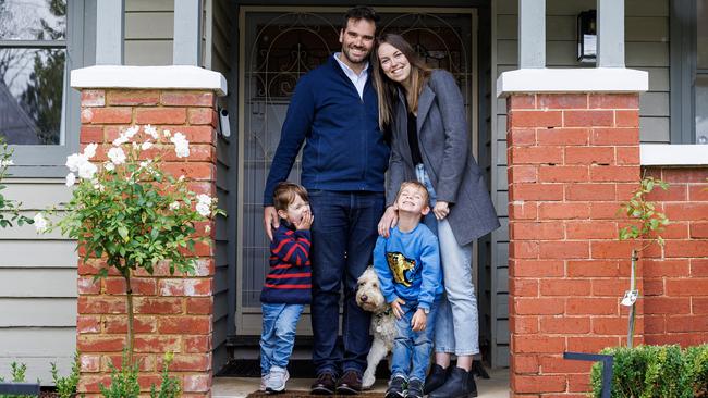 Jeremy Marks, who lost 30kg by limiting starchy foods, with his wife Lisa and their sons Freddie, 2, and Harvey, 4 at their Melbourne home. Picture: Aaron Francis/The Australian