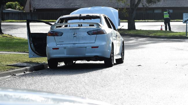 A burnt out car on Carramar Drive Frankston, possibly connected. Picture: Nicole Garmston