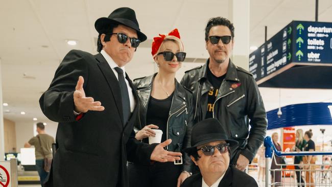 Blues on Broadbeach US headliners Samantha Fish and Jesse Dayton touched down in Gold Coast on Friday, pictured with the Blues Brothers who kept airport guests entertained. Picture: Supplied