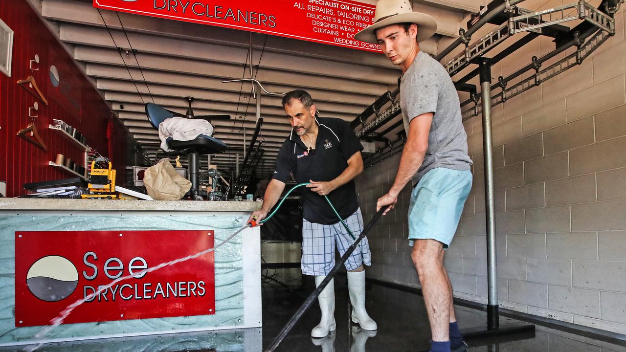 See Drycleaners owner Tony Frangos cleans up his Rosalie village business with Lachie Middendorp. Picture: Zak Simmonds